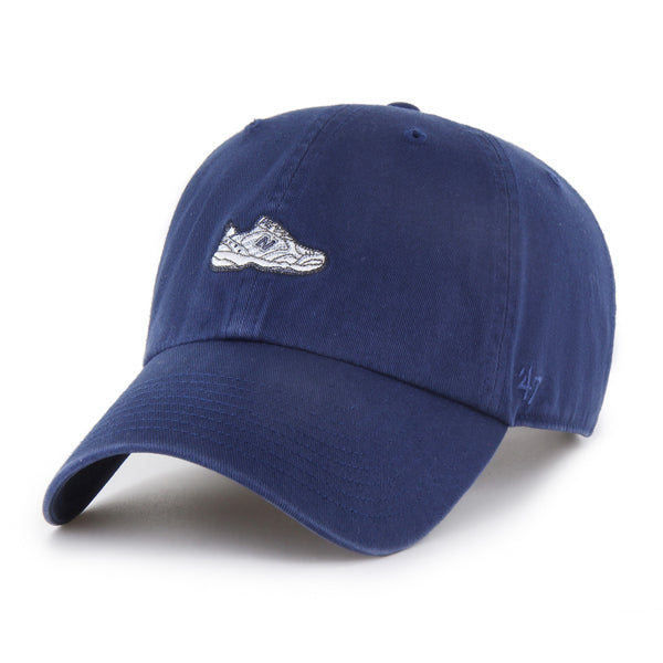 Pictured is this New Balance Dad Shoe ’47 CLEAN UP cap in navy. 1