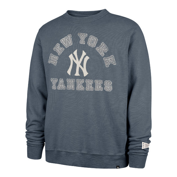 The model is wearing this MLB New York Yankees Calderwood ’47 Crewneck Sweatshirt in grey. 1