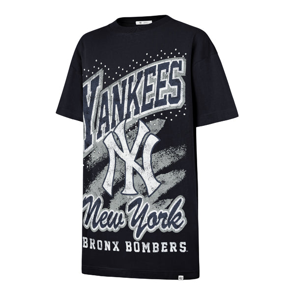 The model is wearing this MLB New York Yankees Womens Gemstone Swash ’47 T-Shirt Dress in navy. 1