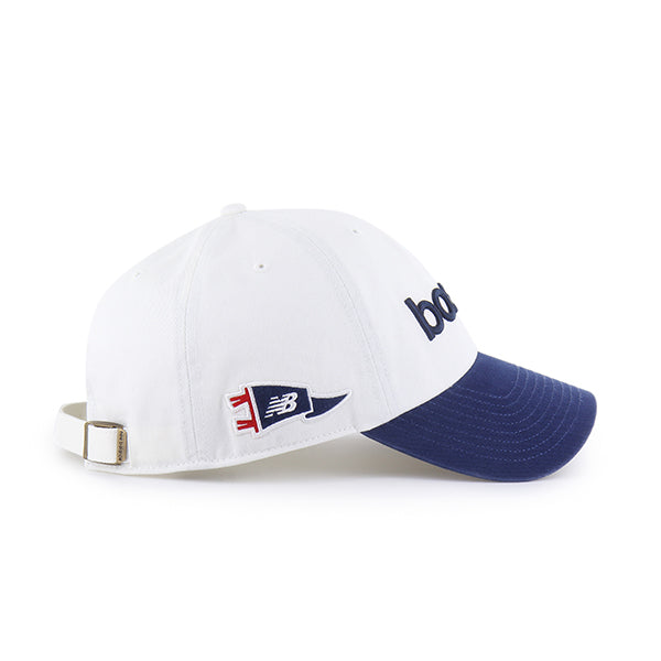 Pictured is this New Balance Grand Slam ’47 CLEAN UP cap in white & navy. 4